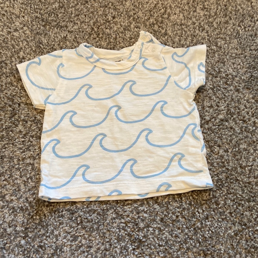 Monica and Andy wave top